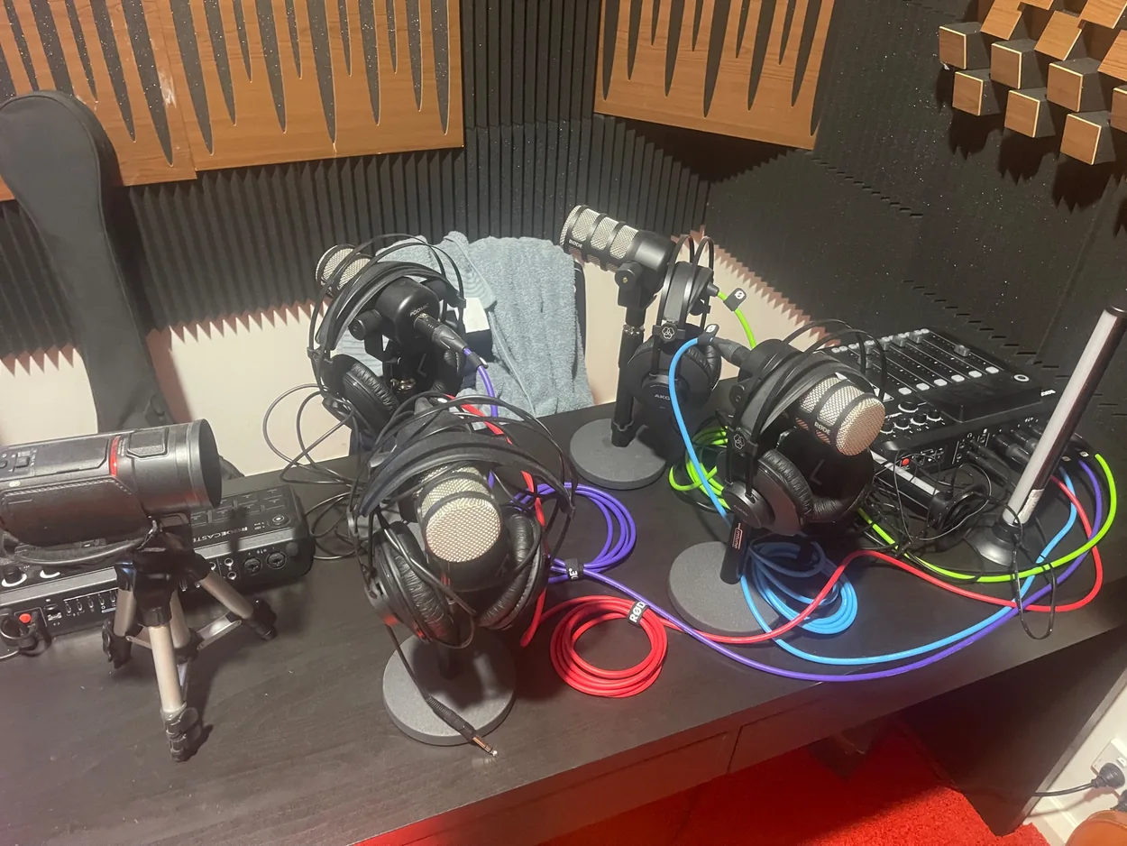 555 actual four-microphone radio and podcast setup with recording console